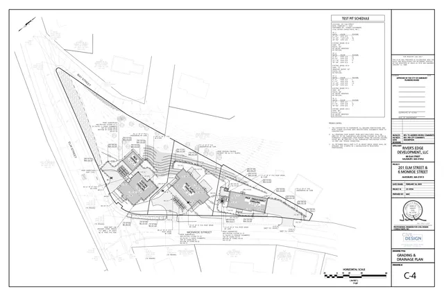 Grading and drainage plan for the 201 Elm Street and 6 Monroe Street project, showing the proposed building footprints, driveways, contours, drainage features, and utility improvements on the existing site. The sheet also includes a title block, project notes, and a test pit schedule.
