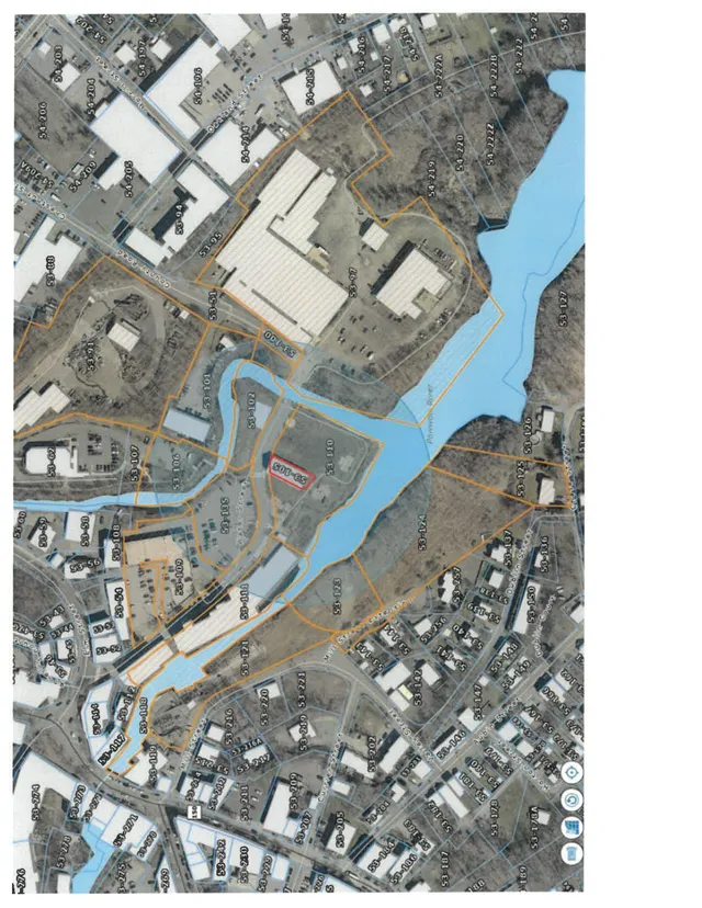 Oblique-looking orthophoto-style aerial map of the Water Street area with parcel boundaries, lot numbers, and a blue waterway overlay. The subject property is outlined in red near the center-left of the image.