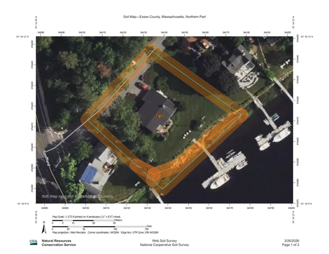 USDA Web Soil Survey map over an aerial photo showing the 3 Old Merrill St site outlined in orange, with soil units labeled across the parcel and nearby waterfront properties and roads visible.