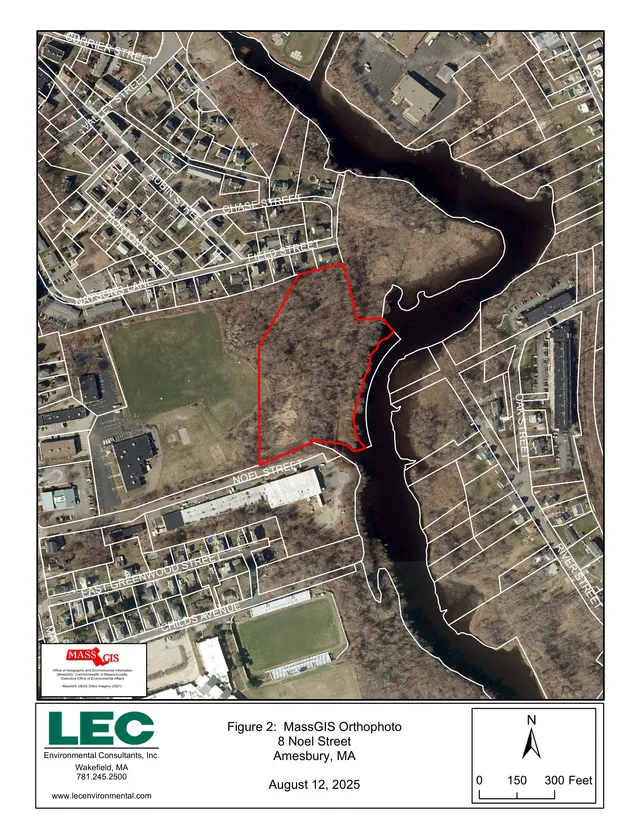 Annotated MassGIS orthophoto showing the 8 Noel Street site outlined in red, with surrounding streets, parcel boundaries, and the nearby river corridor. A title block at the bottom identifies the figure as an orthophoto for Amesbury, Massachusetts.