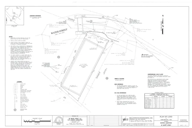 Existing conditions site plan for 29 Water Street in Amesbury, showing the property boundary, Water Street frontage, utilities, easements, benchmark, and zoning table. The drawing includes a locus map, notes, and a title block labeled as existing conditions.