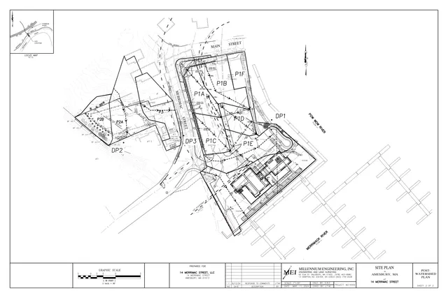 A detailed black-and-white site plan for 14 Merrimac Street in Amesbury, showing the proposed building footprint, grading/drainage features, buffers, property boundaries, and surrounding streets and the Merrimack/Powow River area. A small locus map appears in the upper left, and the title block identifies it as a post-watershed plan.