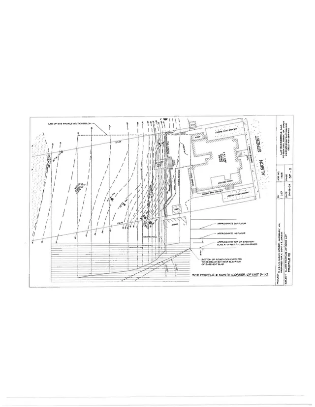 Black-and-white site profile section drawing showing the north corner of Unit 5-1/2 at 5 Albion Street, with grading lines, foundation/basement elevations, and the adjacent house and driveway layout.