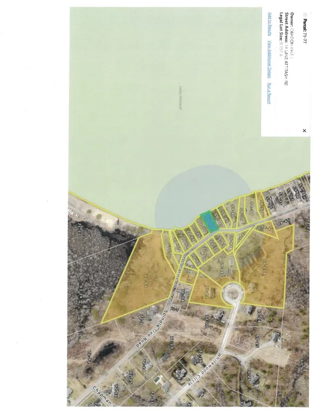An aerial basemap with parcel boundaries outlined in yellow around Lake Attitash and nearby streets, showing the subject lot highlighted near the shoreline. The page is rotated and includes parcel numbers and property context around Lake Attitash Road, Pine Tree Road, and surrounding lots.