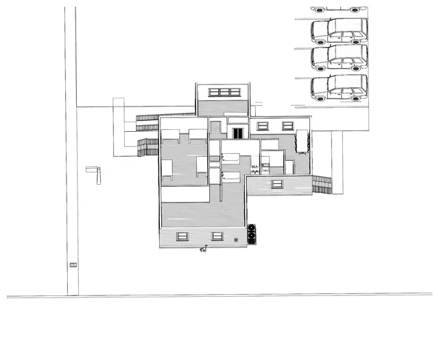 Black-and-white plan view showing the proposed building footprint and site layout, including surrounding parking spaces, drive aisles, and property boundaries.
