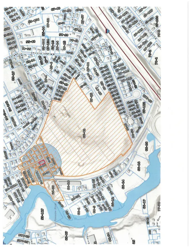 Tax parcel or assessor-style map showing the project area and surrounding lots, with the subject parcel highlighted in orange and nearby parcels labeled by lot number and street names.