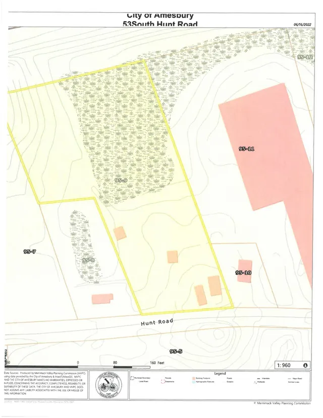 A parcel and topographic map of the 53 South Hunt Road area in Amesbury, showing property boundaries, nearby parcel numbers, Hunt Road, contour lines, wetlands, and building footprints. The project area is highlighted with a yellow outline.