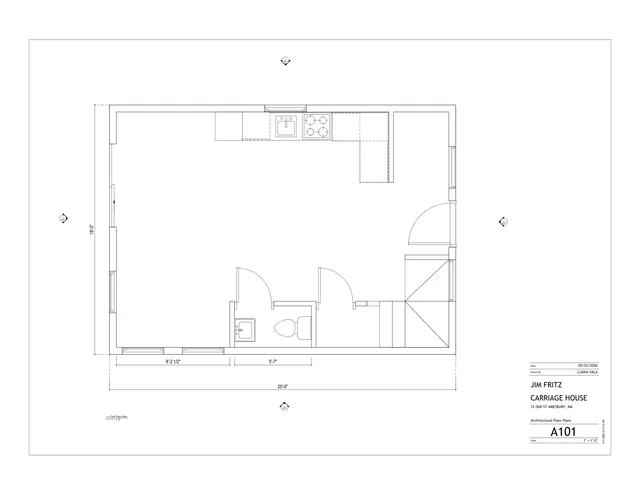 First-floor architectural floor plan for the Jim Fritz Carriage House at 12 Oak St, Amesbury, showing the room layout, kitchen fixtures, bathroom, stair, doors, windows, and overall dimensions.