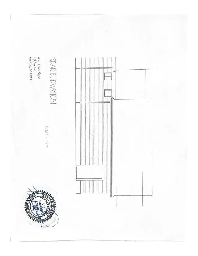 Black-and-white rear elevation drawing for the Fern Ave project, showing the proposed exterior wall surface with two small windows and adjacent building masses on either side. The sheet is labeled "Rear Elevation" and includes a scale and approval stamp.