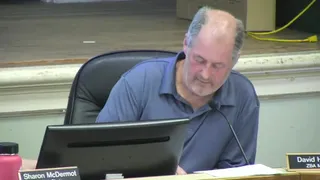 Debate over parking easement, driveway access, and lot setbacks for Pleasant Valley proposal
