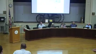 Extended public comment on water infrastructure, parking, dumpsters, and fence/privacy impacts (Main Street/Bartlett area)